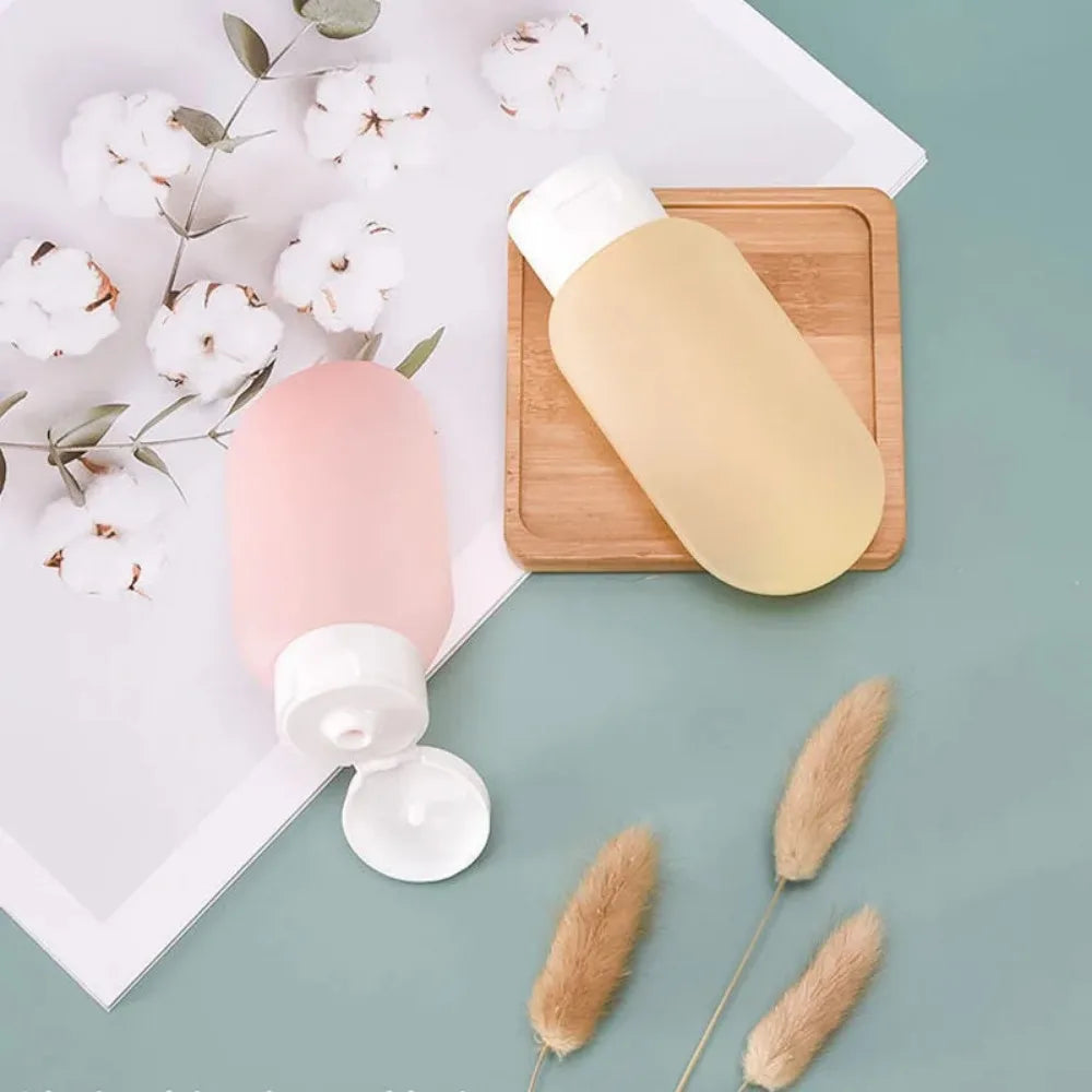 4Pcs 60ml Refillable Silicone Travel Bottles - Leak-Proof Portable Lotion & Shampoo Containers