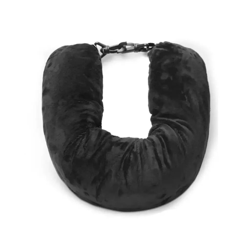 Black neck pillow on a white background