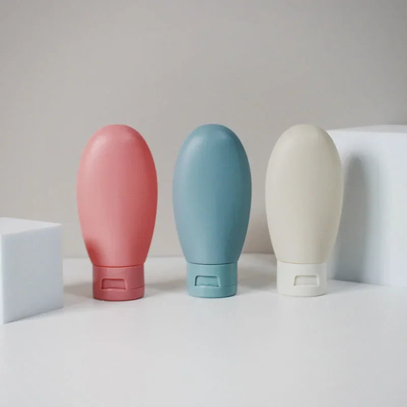 4Pcs 60ml Refillable Silicone Travel Bottles - Leak-Proof Portable Lotion & Shampoo Containers