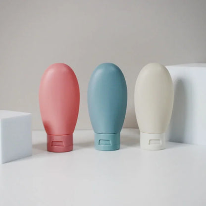4Pcs 60ml Refillable Silicone Travel Bottles - Leak-Proof Portable Lotion & Shampoo Containers