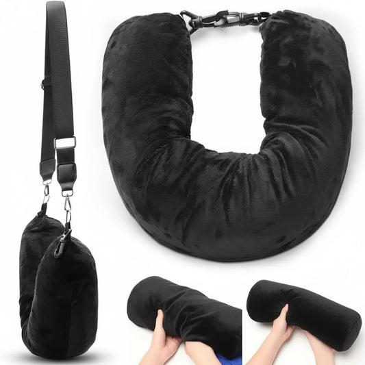 Black travel neck pillow with carrying strap on a white background