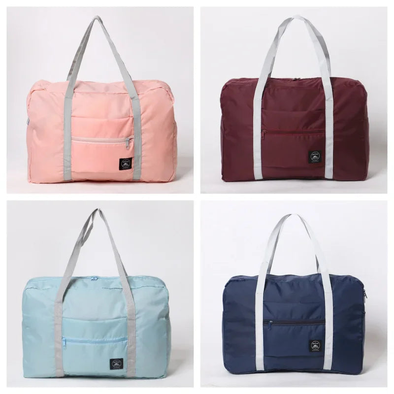 Four different colored duffel bags on a white background