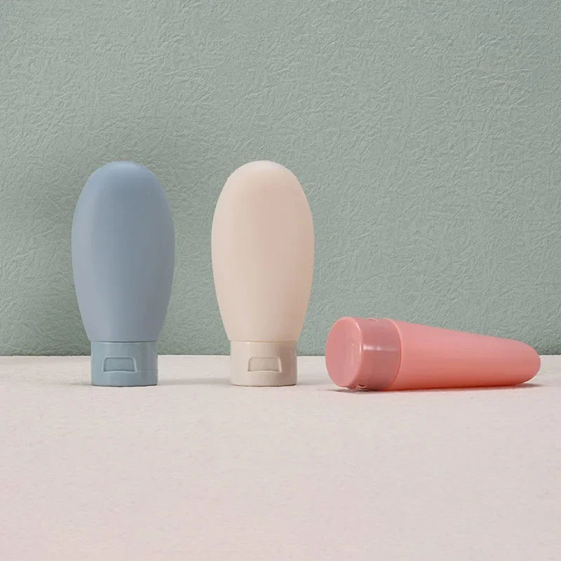 4Pcs 60ml Refillable Silicone Travel Bottles - Leak-Proof Portable Lotion & Shampoo Containers